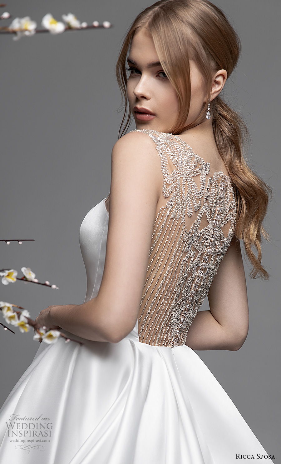 ricca sposa spring 2021 bridal sleeveless illusion bateau straight across neckline simple clean minimalist princess ball gown a  line wedding dress embellished back royal train (7) zbv