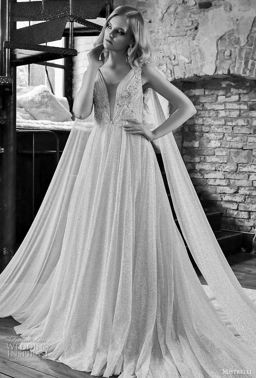 mistrelli 2021 royal drama bridal sleeveless with strap deep plunging v neck full embellishment glamorous a line wedding dress embellished back chapel train (8) mv mistrelli 2021 royal drama bridal sleeveless with strap deep plunging v neck full embellishment glamorous a line wedding dress embellished back chapel train (8) mv
