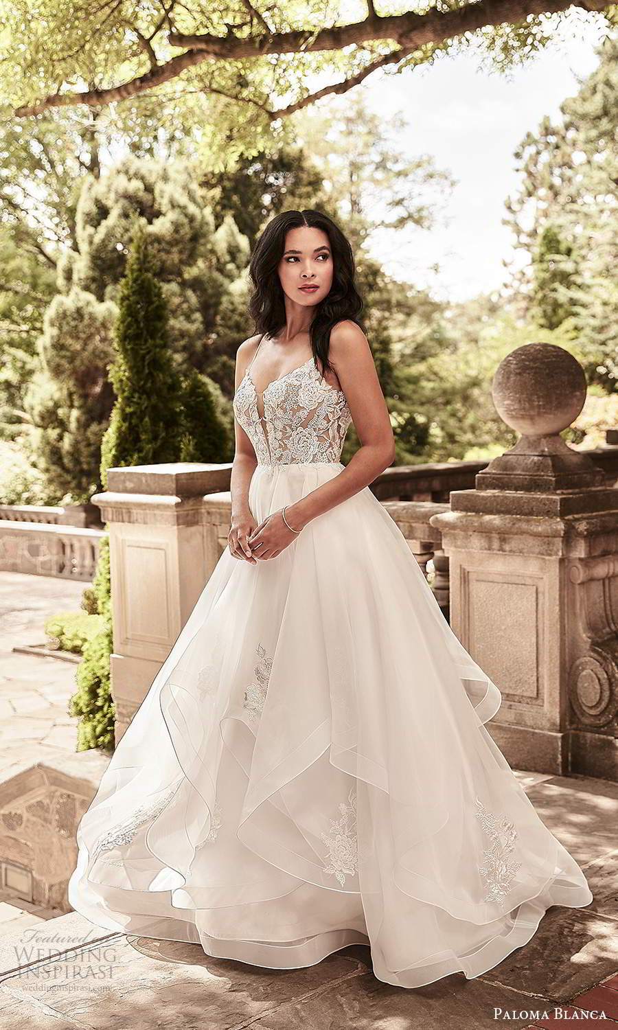 paloma blanca spring 2021 bridal sleeveless thin straps plunging v neckline embellished lace bodice a line ball gown wedding dress tiered skirt chapel train (8) mv