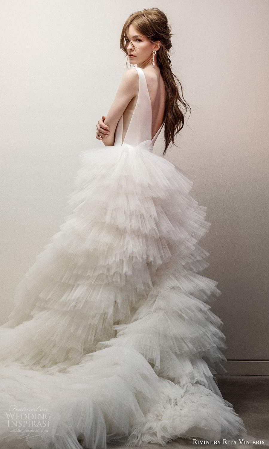rivini rita vinieris fall 2021 bridal sleeveless straps plunging v neckline clean bodice a line ball gown wedding dress ruffle skirt chapel train (4) bv rivini rita vinieris fall 2021 bridal sleeveless straps plunging v neckline clean bodice a line ball gown wedding dress ruffle skirt chapel train (4) bv