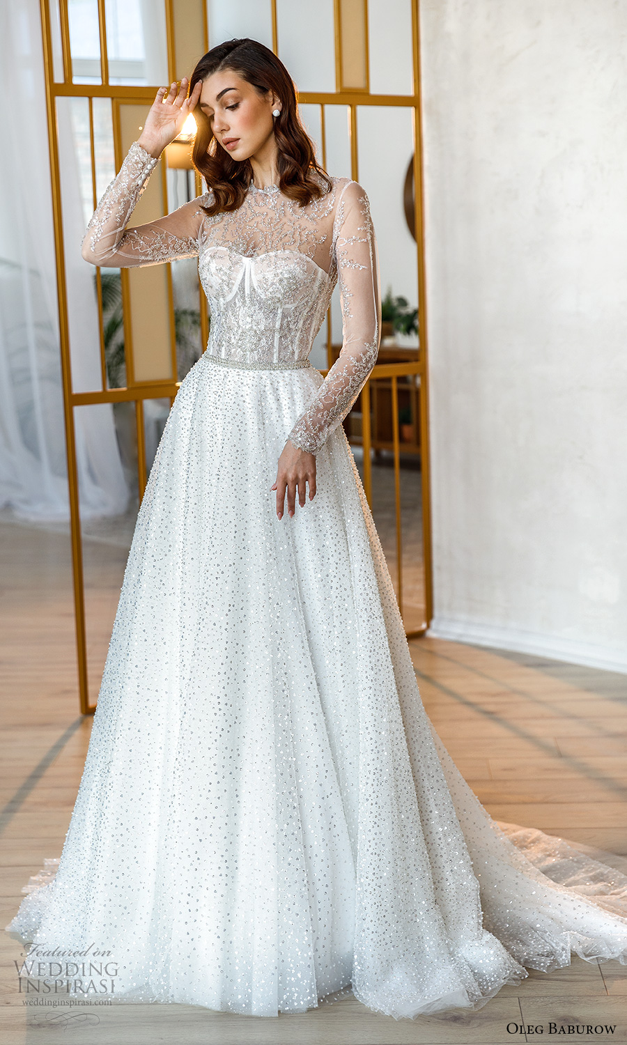 oleg baburow fall 2021 bridal sheer long sleeves illusion jewel neck sweetheart neckline fully embellished glitzy a line ball gown wedding dress chapel train (9) mv