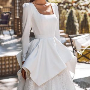 katy corso 2021 bridal long puff sleeves square neckline clean bodice embellished lace skirt peplum a line ball gown wedding dress chapel train (5) zv