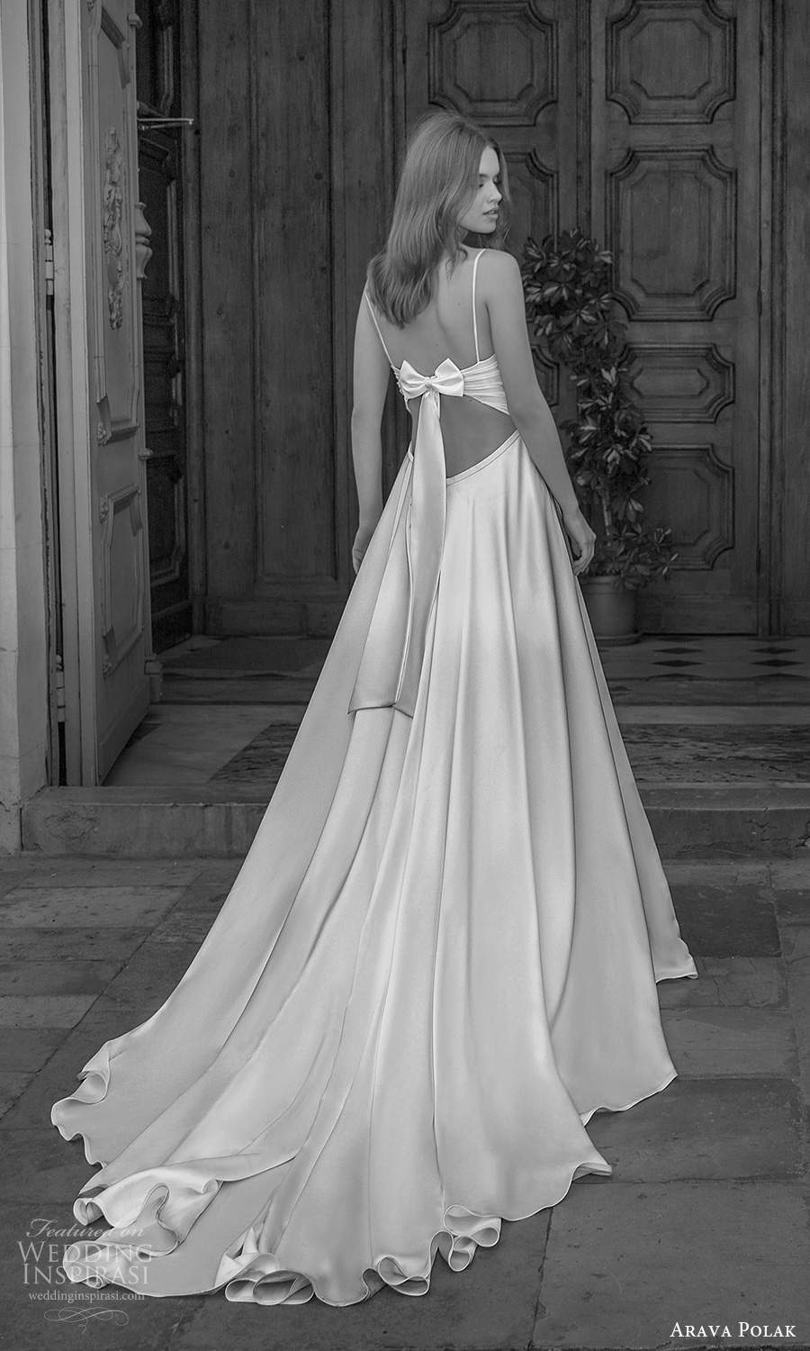 arava polak 2021 bridal sleeveless spaghetti straps sweetheart neckline ruched bodice clean minimalist a line ball gown wedding dress chapel train cutout bow back (10) mv arava polak 2021 bridal sleeveless spaghetti straps sweetheart neckline ruched bodice clean minimalist a line ball gown wedding dress chapel train cutout bow back (10) mv