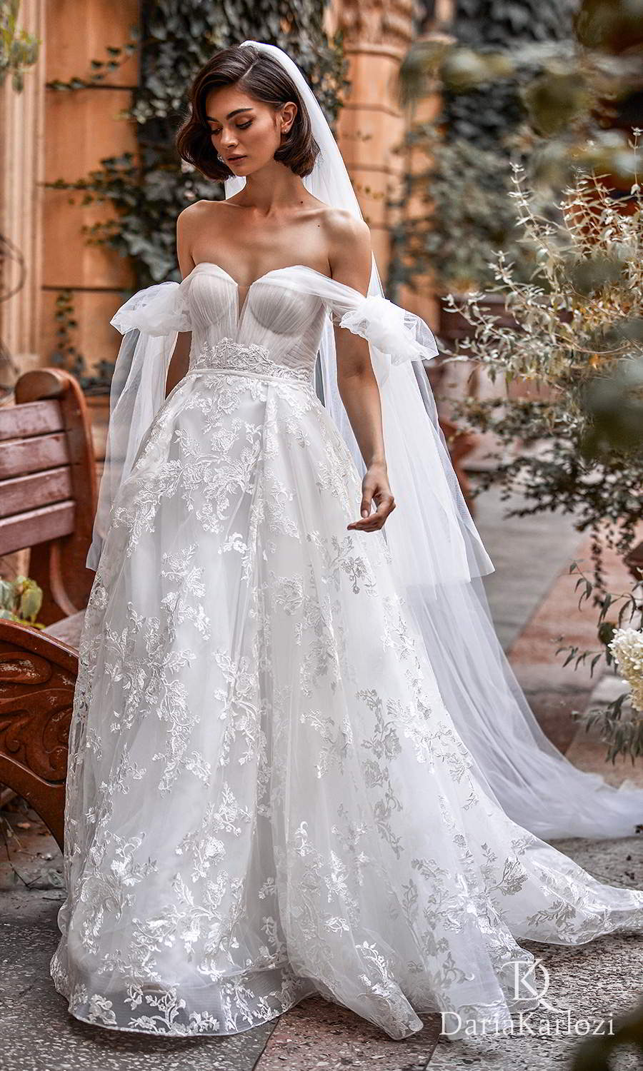 daria karlozi 2021 graceful dream bridal off shoulder straps sweetheart neckline ruched bodice lace skirt a line ball gown wedding dress chapel train (wings of love) mv