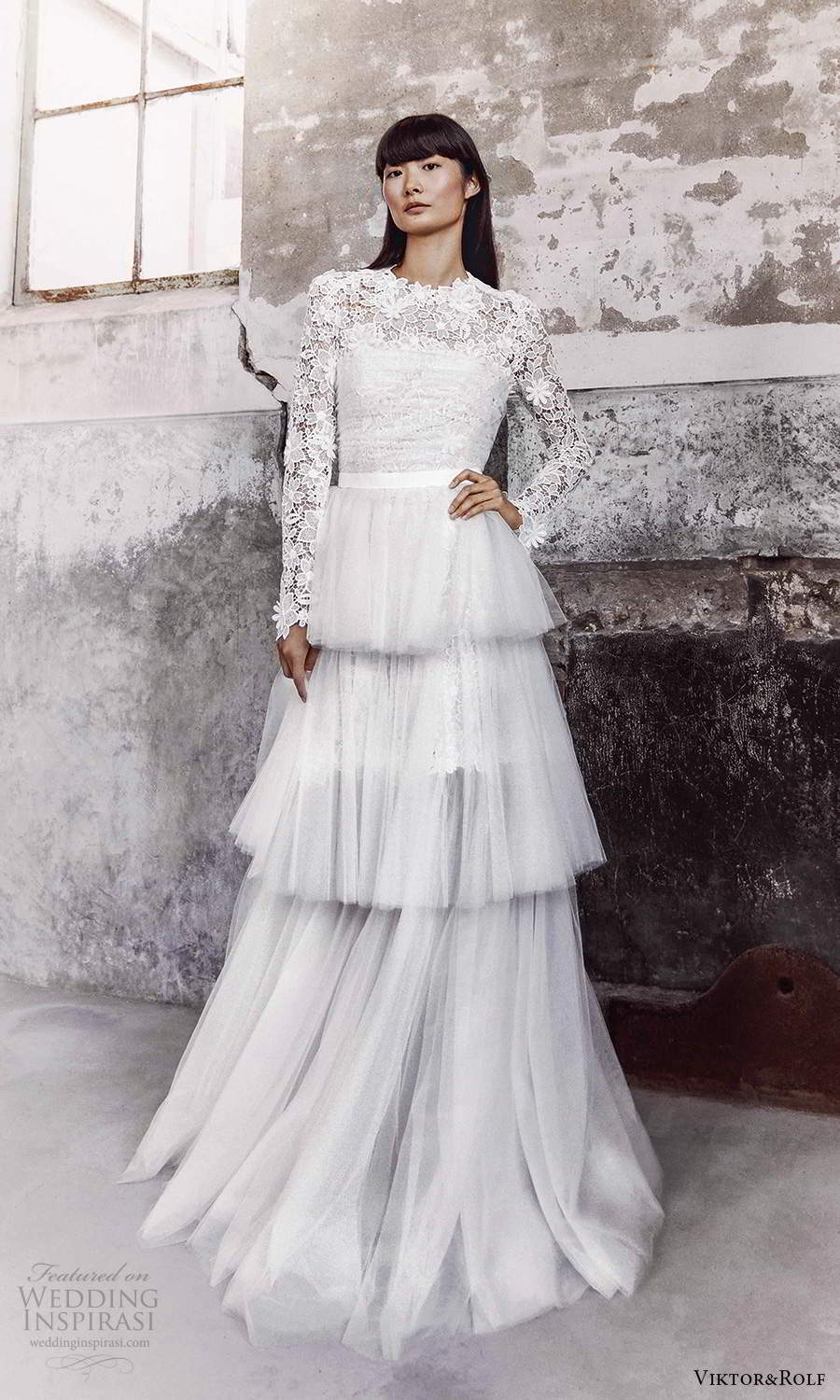 viktor and rolf fall 2021 bridal long sleeves high neckline embellished lace a line wedding dress tiered skirt (6) mv