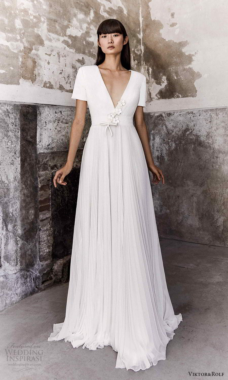 viktor and rolf fall 2021 bridal short sleeve v neckline clean minimalist a line ball gown wedding dress pleated skirt chapel train (18) mv