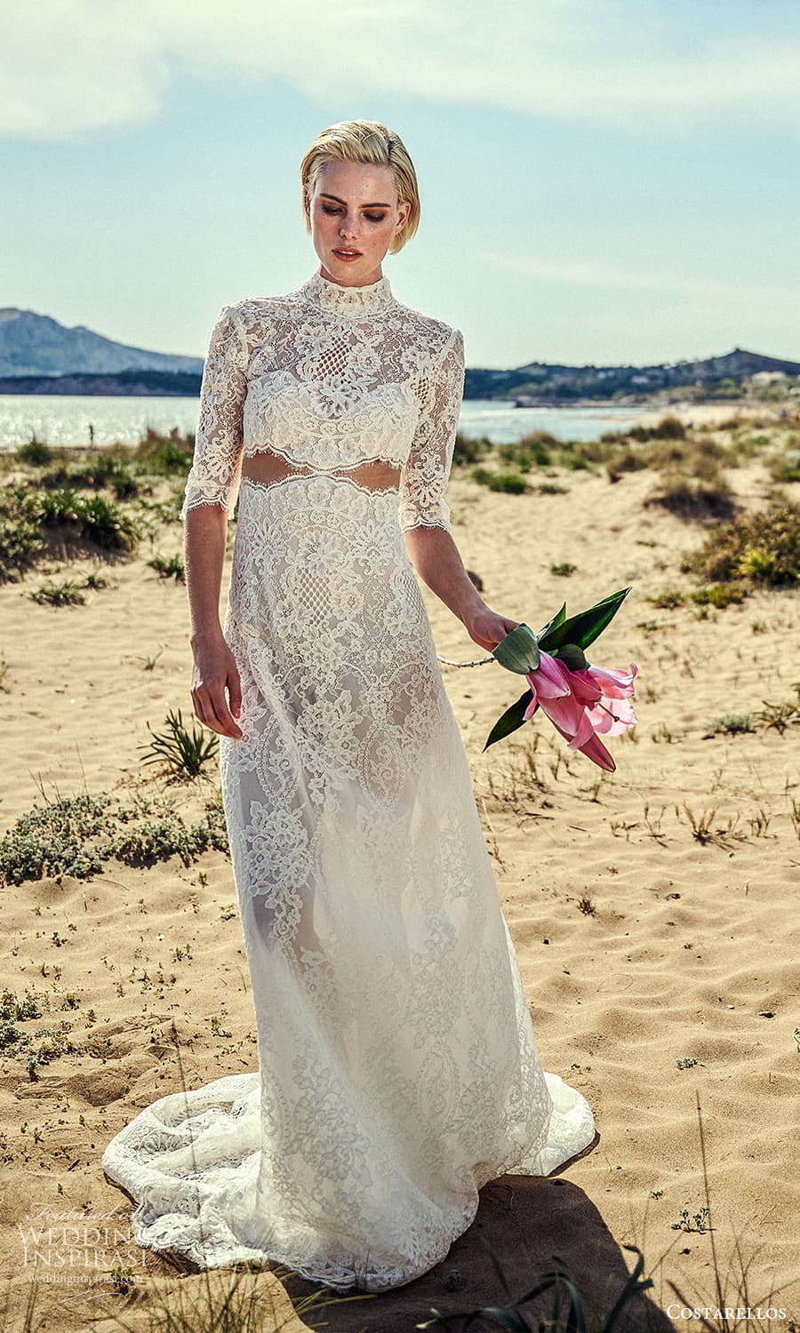 costarellos spring 2022 bridal elbow length sleeves high neckline fully embellished lace sheath wedding dress chapel train (20) mv costarellos spring 2022 bridal elbow length sleeves high neckline fully embellished lace sheath wedding dress chapel train (20) mv