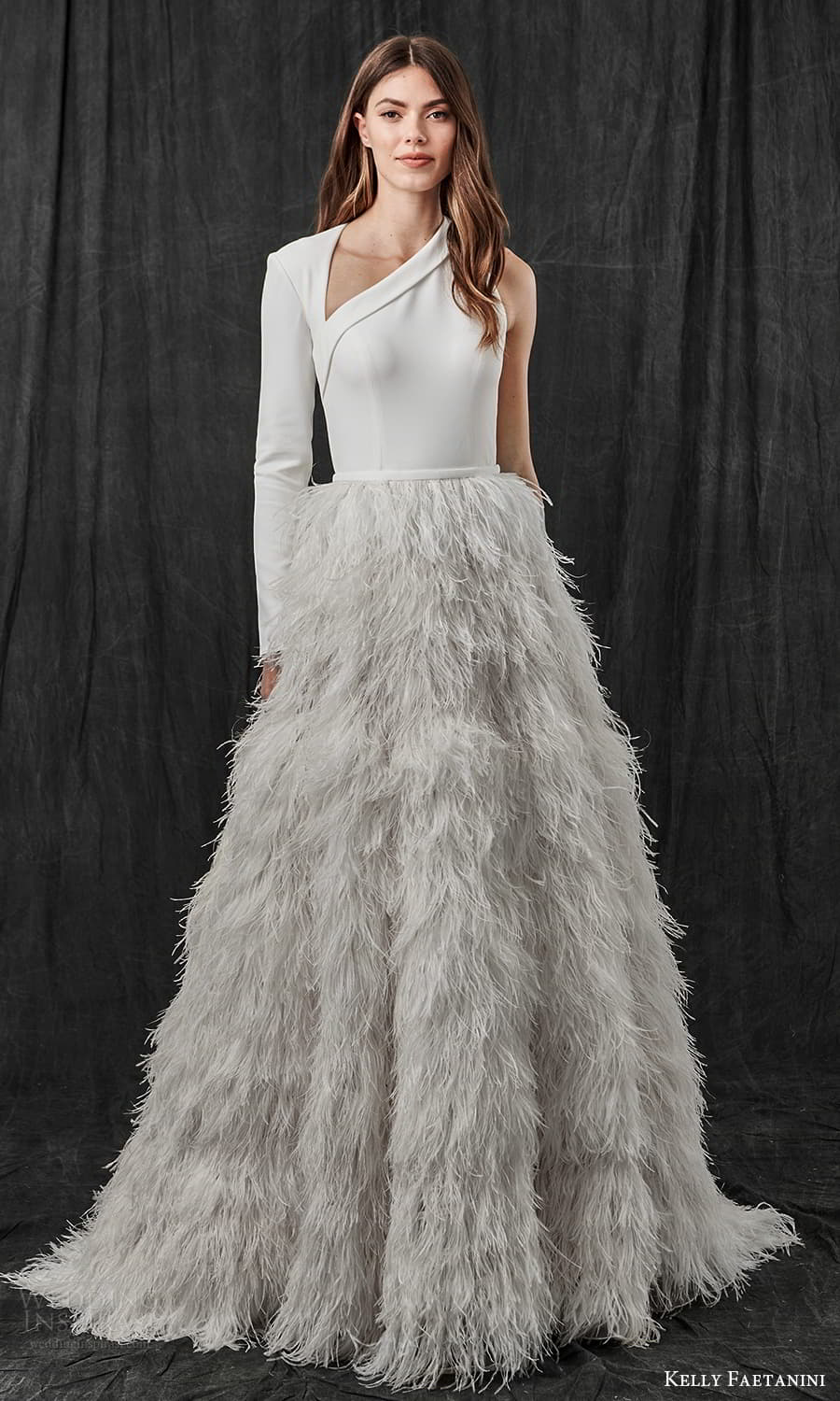 kelly faetanini spring 2022 bridal one shoulder long sleeve asymmetric neckline clean bodice feather skirt a line ball gown wedding dress sweep train cutout back (7) mv