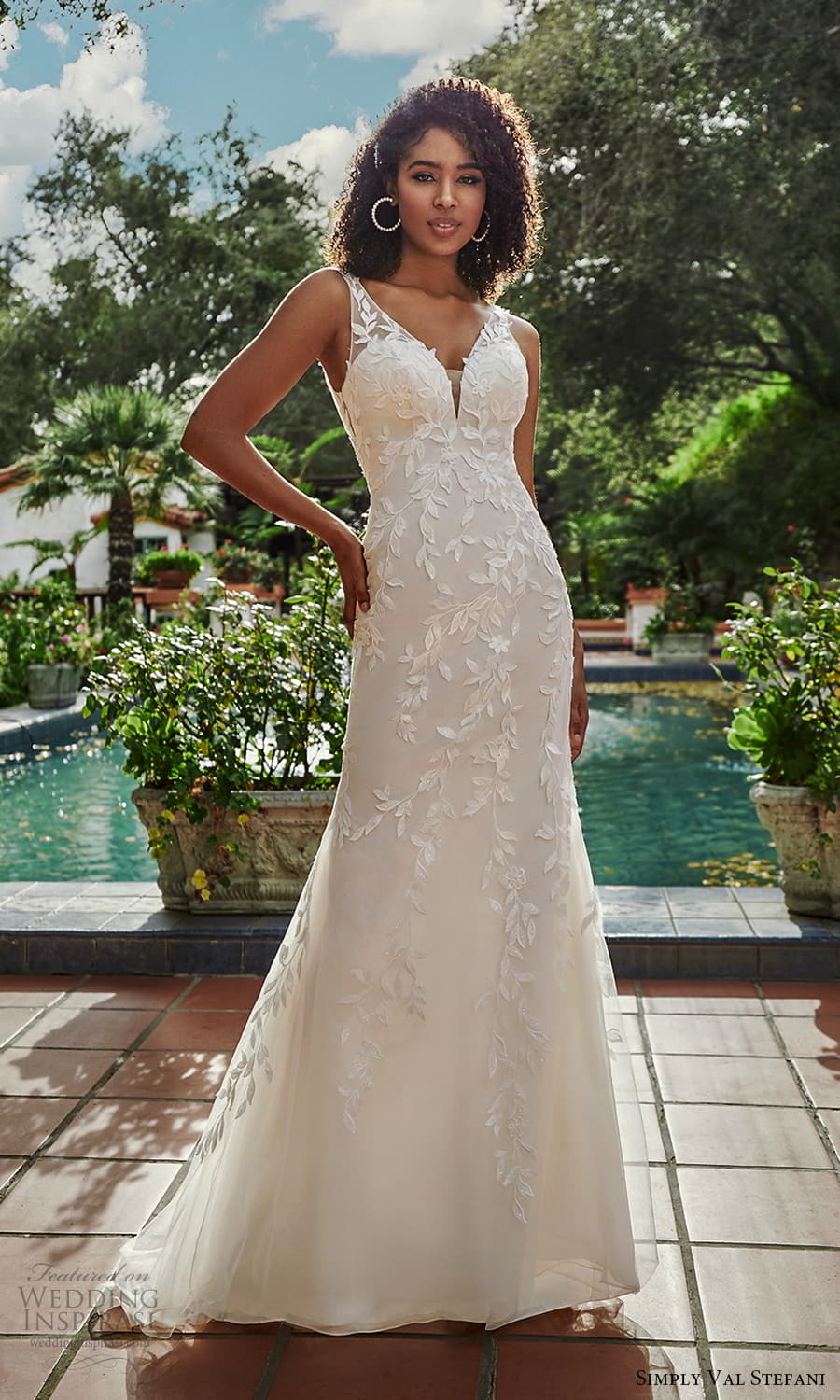 https://www.weddinginspirasi.com/wp-content/uploads/2021/05/simply-val-stefani-spring-2022-bridal-sleeveless-sheer-straps-v-neckline-embellished-fit-flare-sheath-wedding-dress-1-mv.jpg