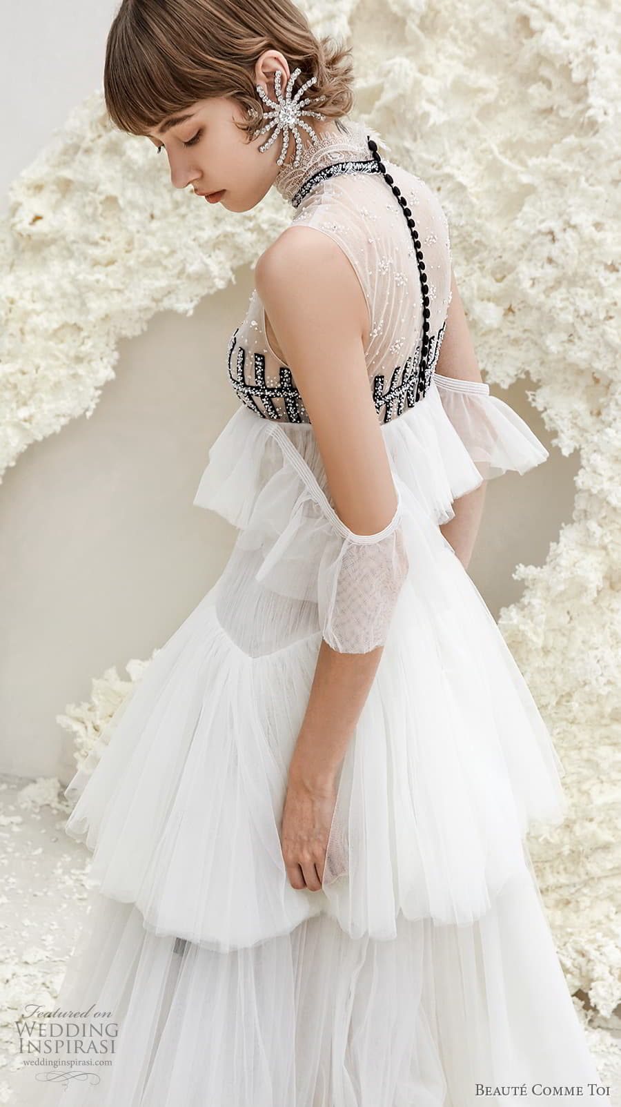 beaute comme toi spring 2022 bridal sleeveless high neck lightly embellished bodice empire a line wedding dress sheer button back tiered skirt sweep train (faye) zbv