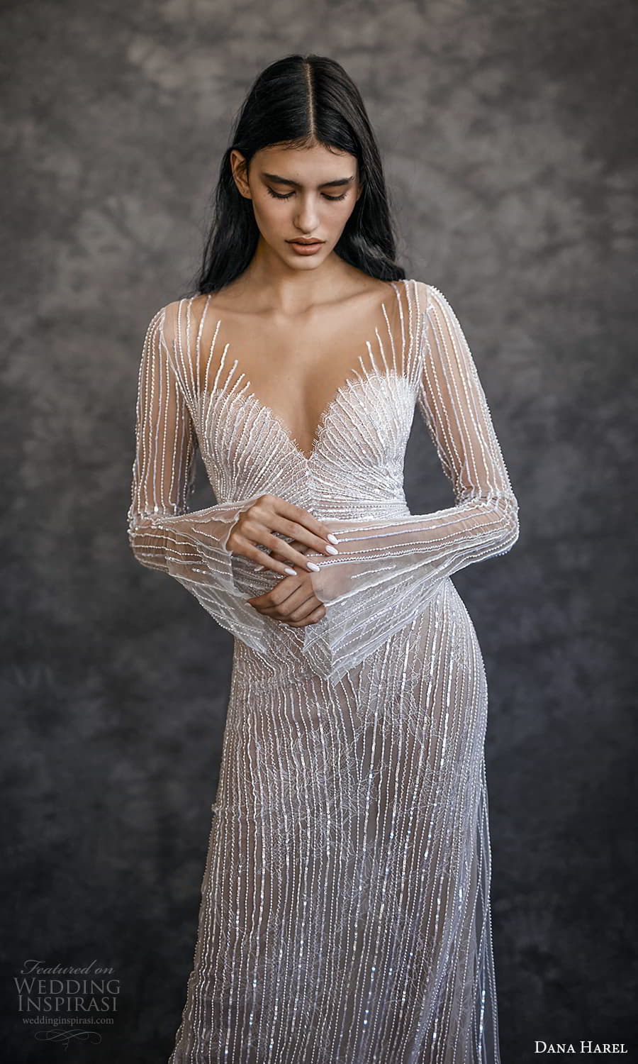 dana harel spring 2022 bridal long flare sleeves sweetheart v neckline fully embellished sheath wedding dress chapel train (7) zv