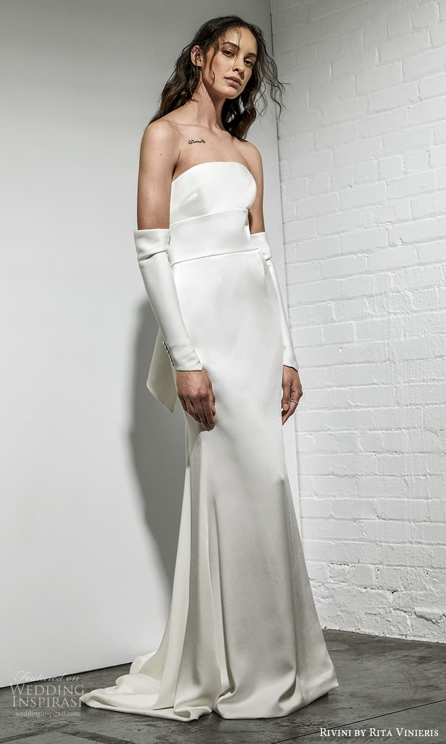 rivini rita vinieris spring 2022 bridal strapelss straight across neckline clean minimalist sheath wedding dress sweep train (3) mv rivini rita vinieris spring 2022 bridal strapelss straight across neckline clean minimalist sheath wedding dress sweep train (3) mv