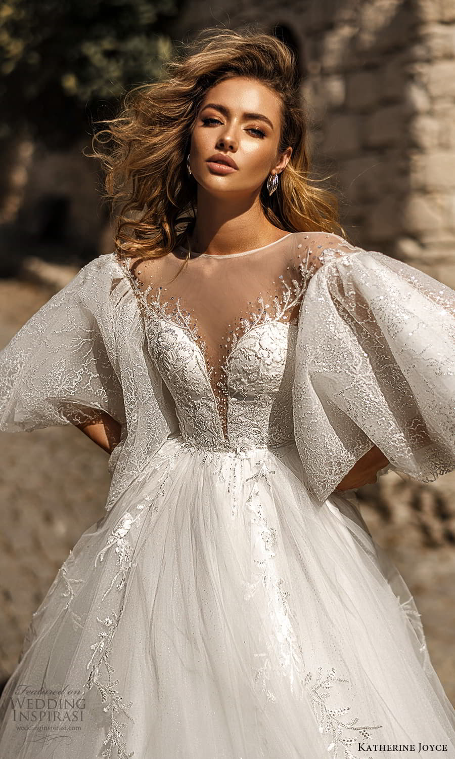 katherine joyce 2022 bridal flutter flare sleeve sheer bateau neck plunging v neckline fully embellished lace bodice a line wedding dress chapel train (14) zv