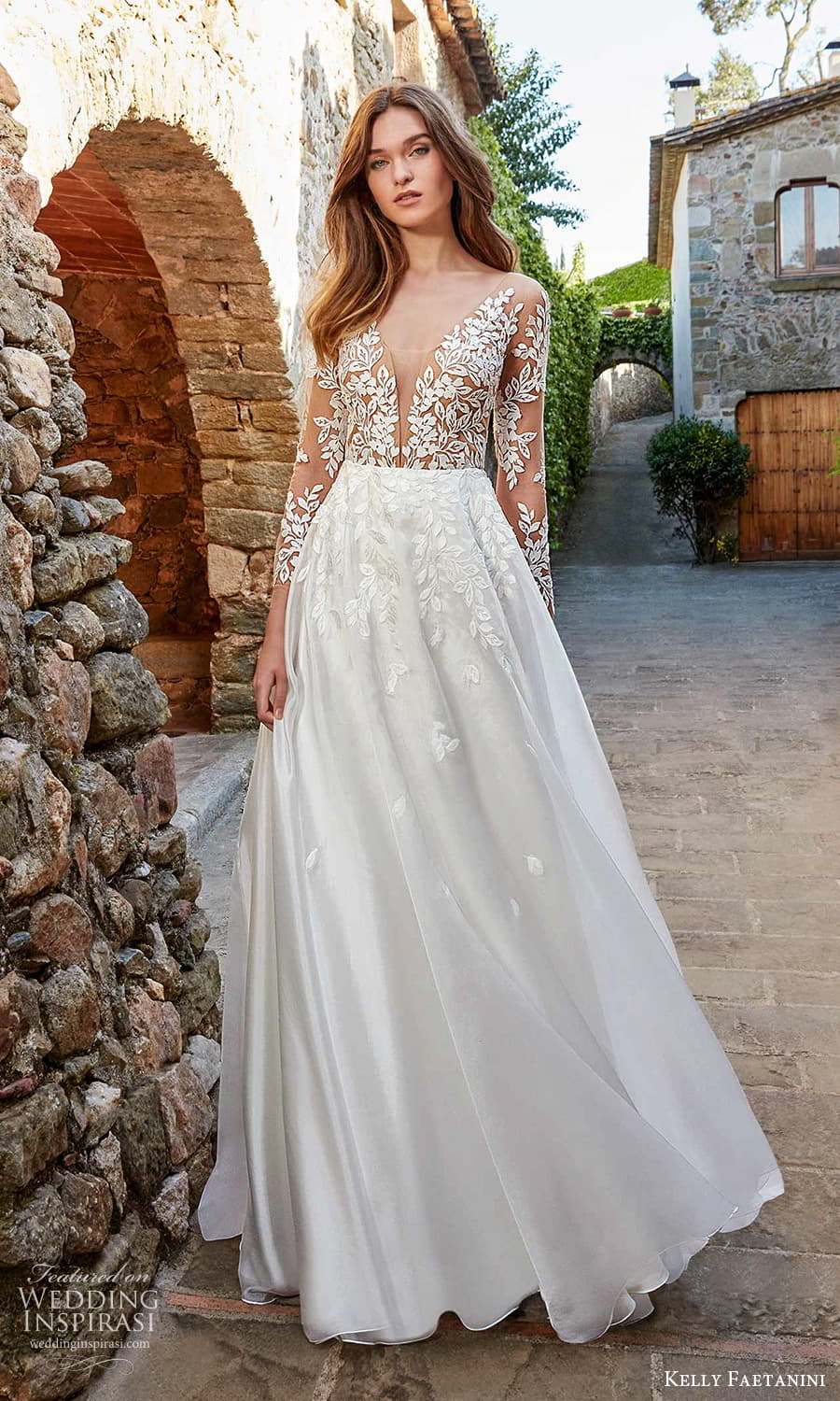 kelly faetanini spring 2022 campaign bridal sheer long sleeve plunging v neckline embellished lace a line ball gown wedding dress chapel train (19) mv