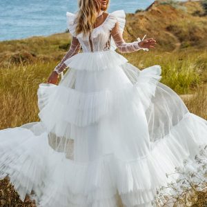 la petra 2021 bridal sheer long sleeve flutter illusion jewel neckline tiered skirt a line ball gown wedding dress chapel train (8) fv
