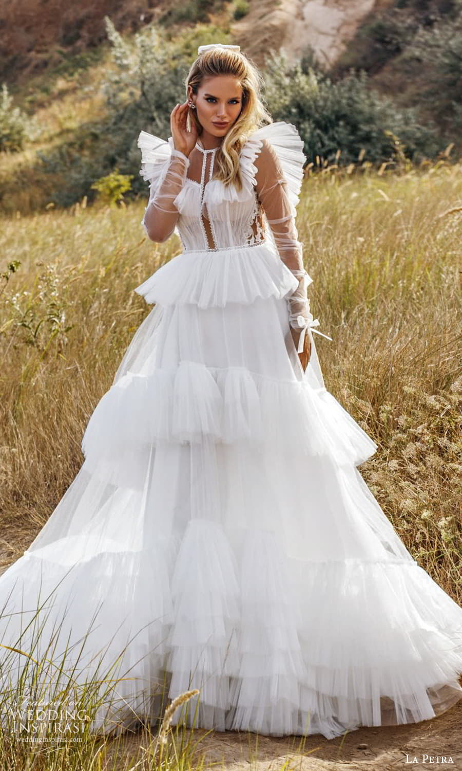 la petra 2021 bridal sheer long sleeve flutter illusion jewel neckline tiered skirt a line ball gown wedding dress chapel train (8) mv