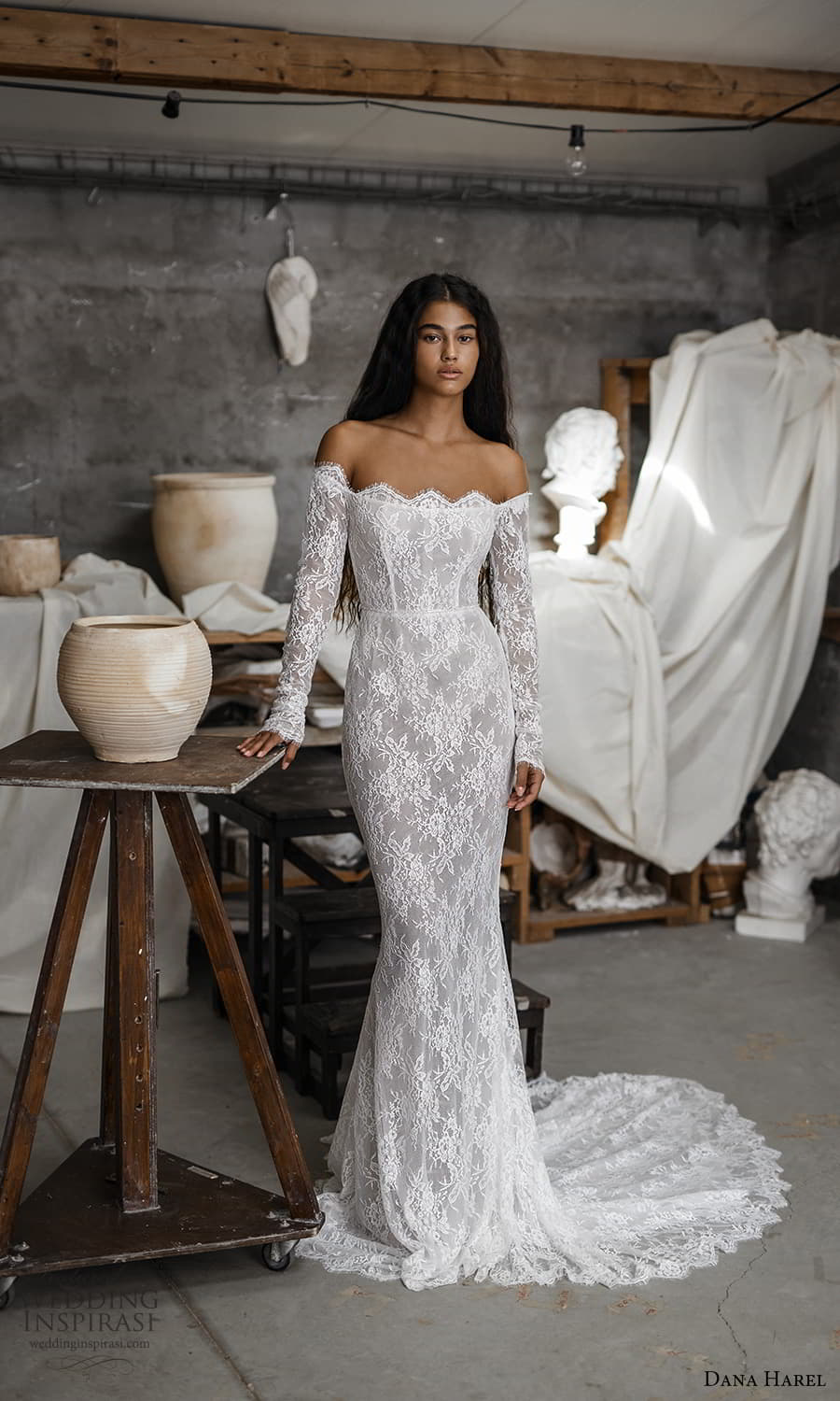 dana harel fall 2022 bridal off shoulder long sleeve scalloped neckline fully embellished lace sheath wedding dress chapel train (1) mv