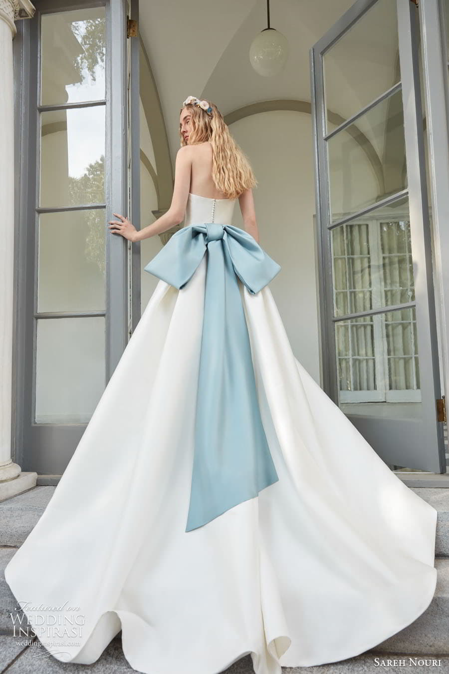 sareh nouri fall 2022 bridal strapless straight across neckline clean minimalist a line ball gown wedding dress chapel train blue bow (5) bv 