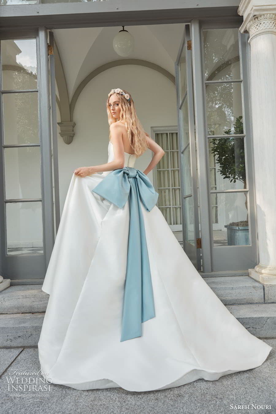 sareh nouri fall 2022 bridal strapless straight across neckline clean minimalist a line ball gown wedding dress chapel train blue bow (5) bv