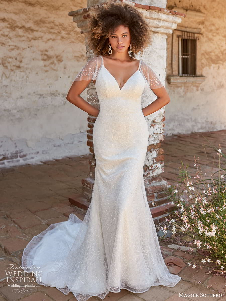 maggie sottero spring 2022 bridal sheer flutter sleeve strap clean minimalist sheath wedding dress chapel train (16) mv maggie sottero spring 2022 bridal sheer flutter sleeve strap clean minimalist sheath wedding dress chapel train (16) mv