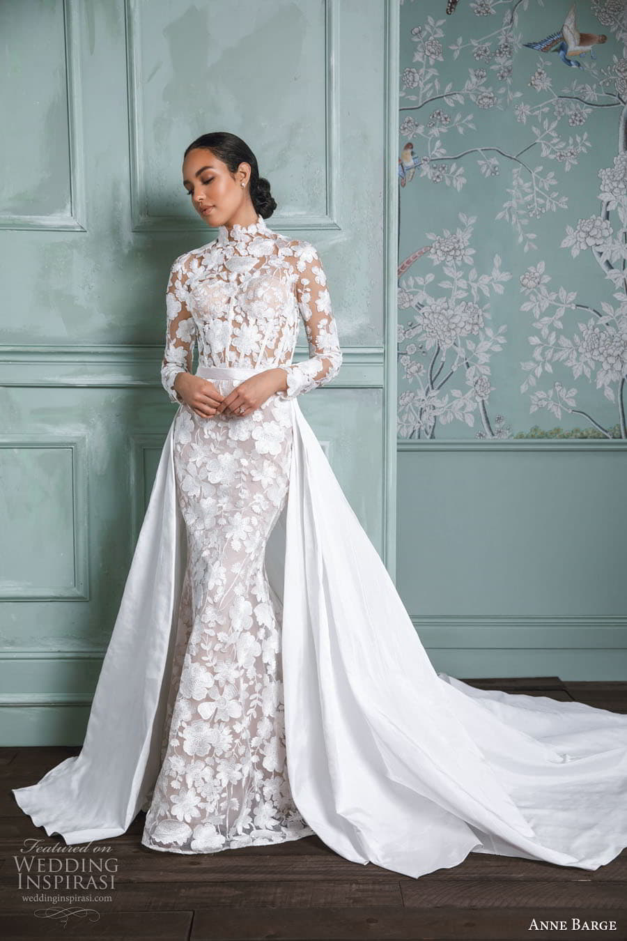 anne barge spring 2023 bridal sheer long sleeve high neckline fully embellished lace sheath wedding dress keyhole back chapel train a line overskirt (1) mv