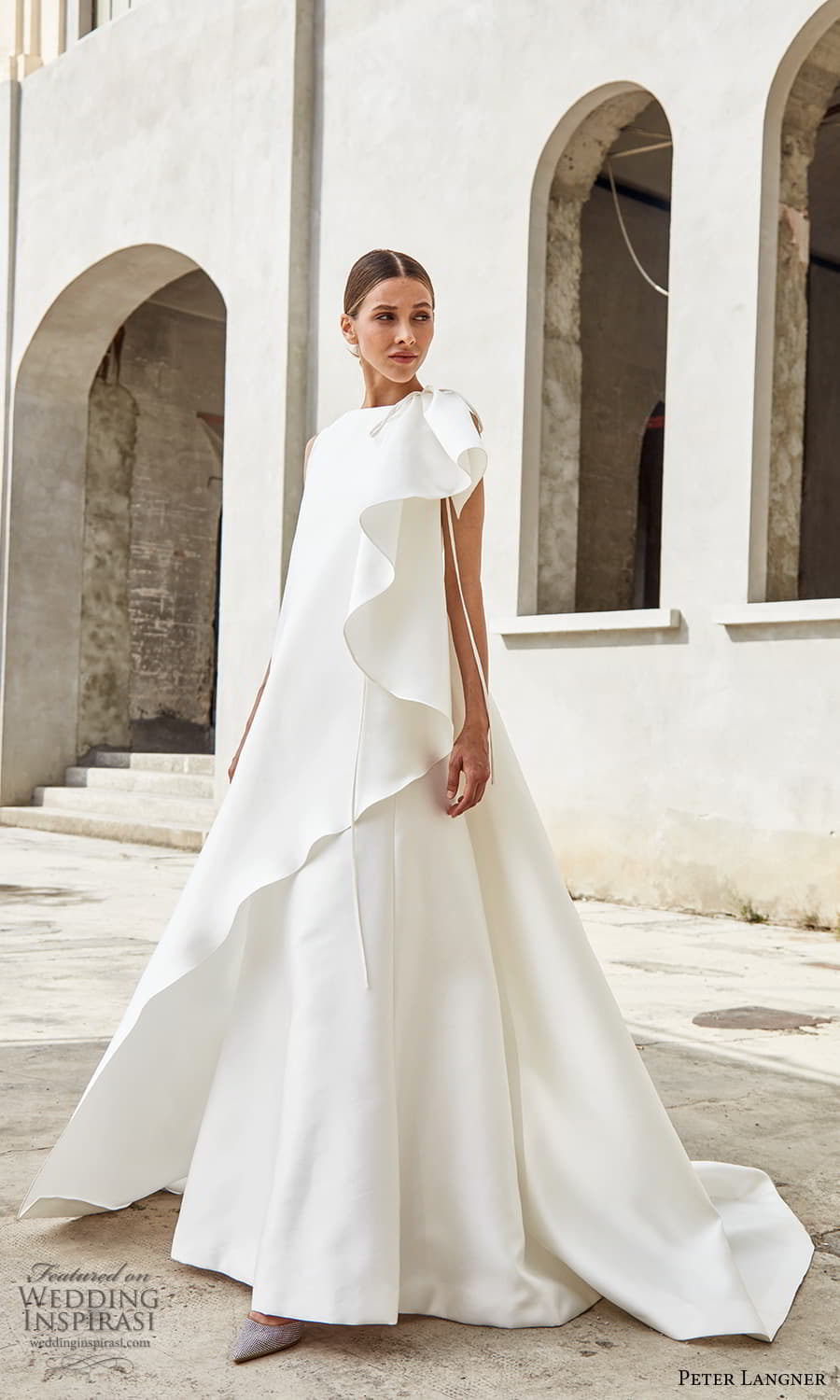 peter langner spring 2022 bridal asymmetric sleeveless jewel neckline clean minimalist a line tent wedding dress chapel train (8) mv