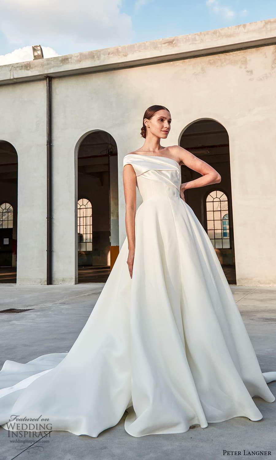 peter langner spring 2022 bridal one shoulder strap asymmetric neckline clean minimalist a line ball gown wedding dress chapel train (1) fv