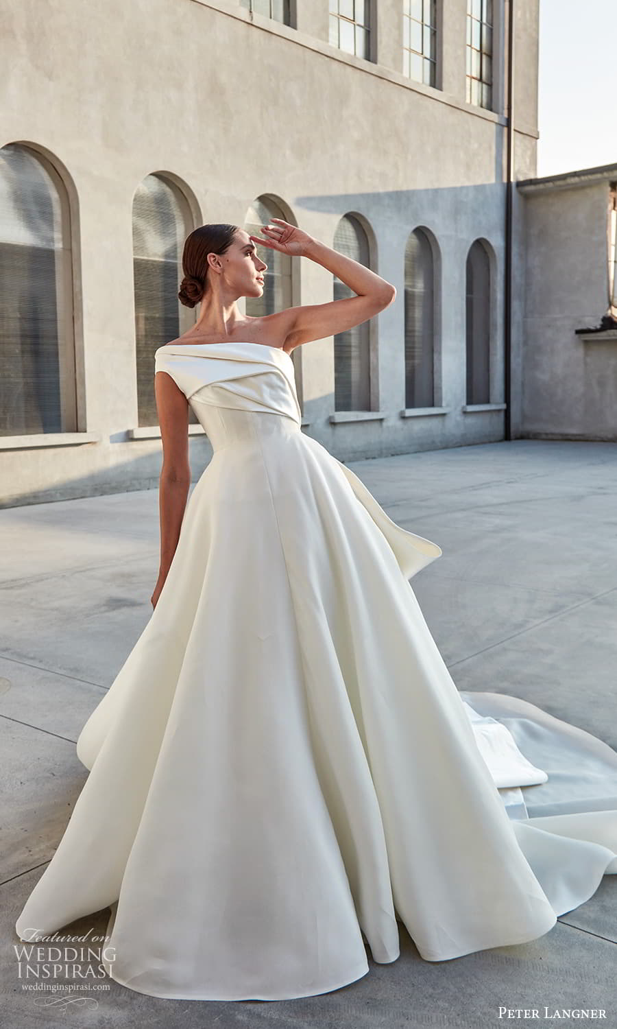 peter langner spring 2022 bridal one shoulder strap asymmetric neckline clean minimalist a line ball gown wedding dress chapel train (1) mv