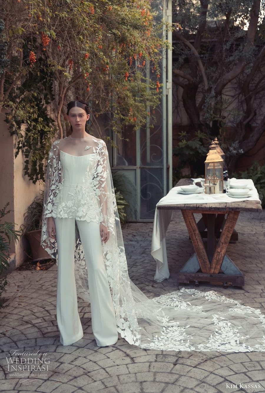kim kassas couture spring 2023 bridal sheer cape sleeve semi sweetheart neckline clean minimalist pant suit wedding dress (7) mv