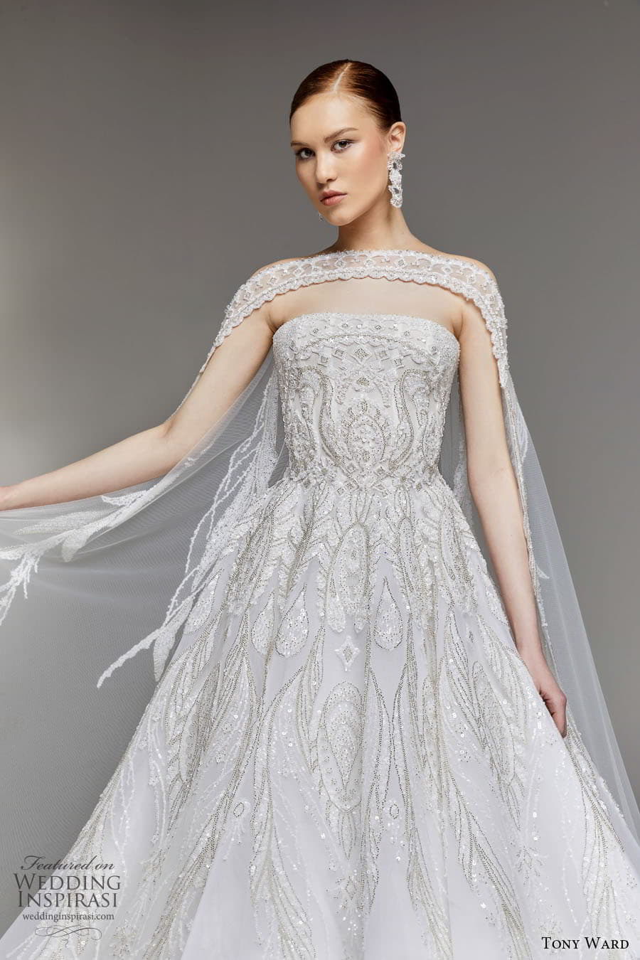 tony ward spring 2023 bridal strapless straight across neckline fully embellished a line ball gown wedding dress chapel train sheer cape (1) zv