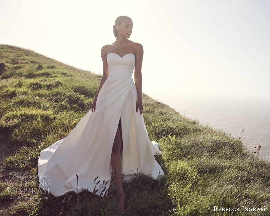 rebecca ingram spring 2023 bridal sleeveless strapless sweethaert zelda a line wedding dress chapel train mv (1) rebecca ingram spring 2023 bridal sleeveless strapless sweethaert zelda a line wedding dress chapel train mv (1)