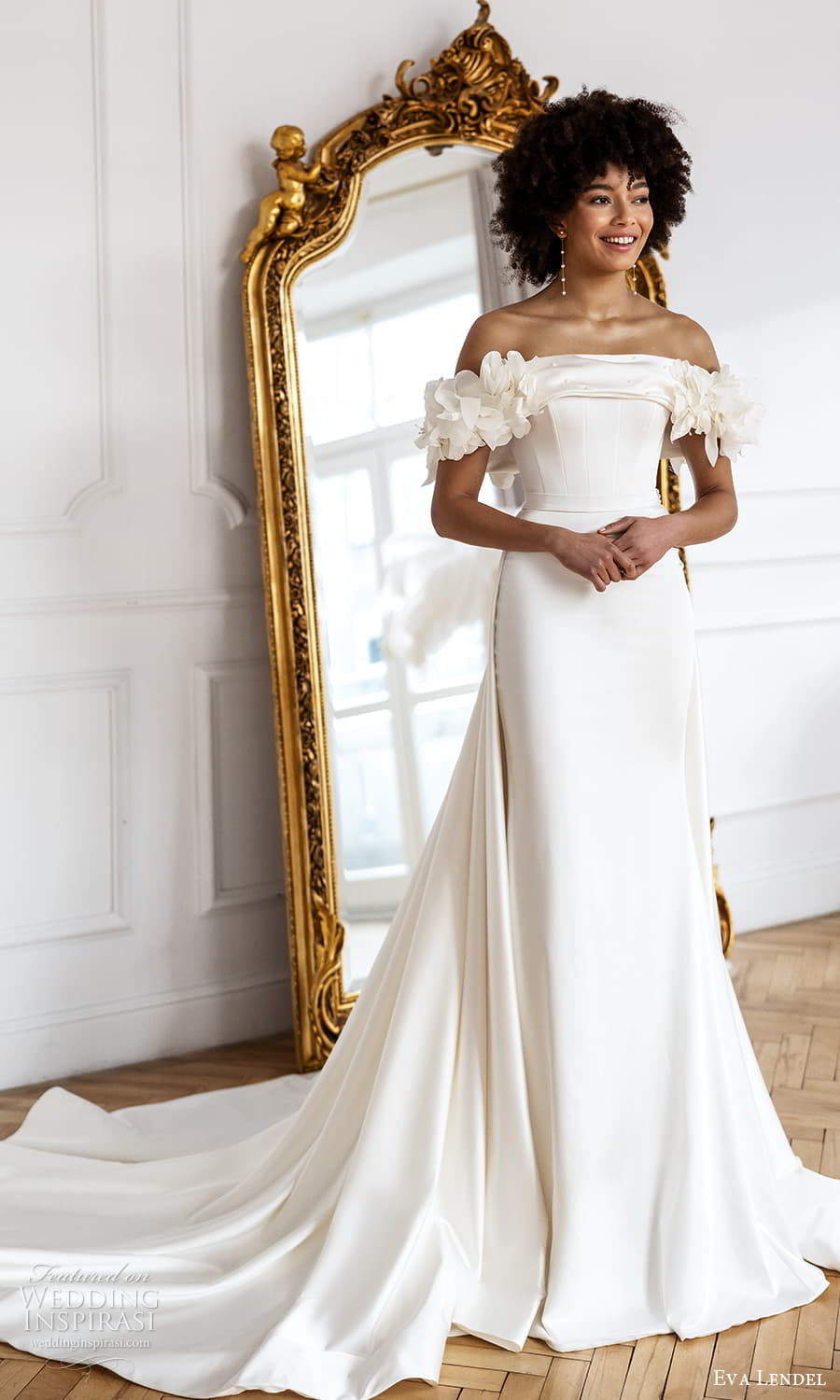 eva lendel fall 2023 bridal off shoulder swag sleeve straight across neckline clean minimalist sheath wedding dress a line overskirt chapel train (26) mv