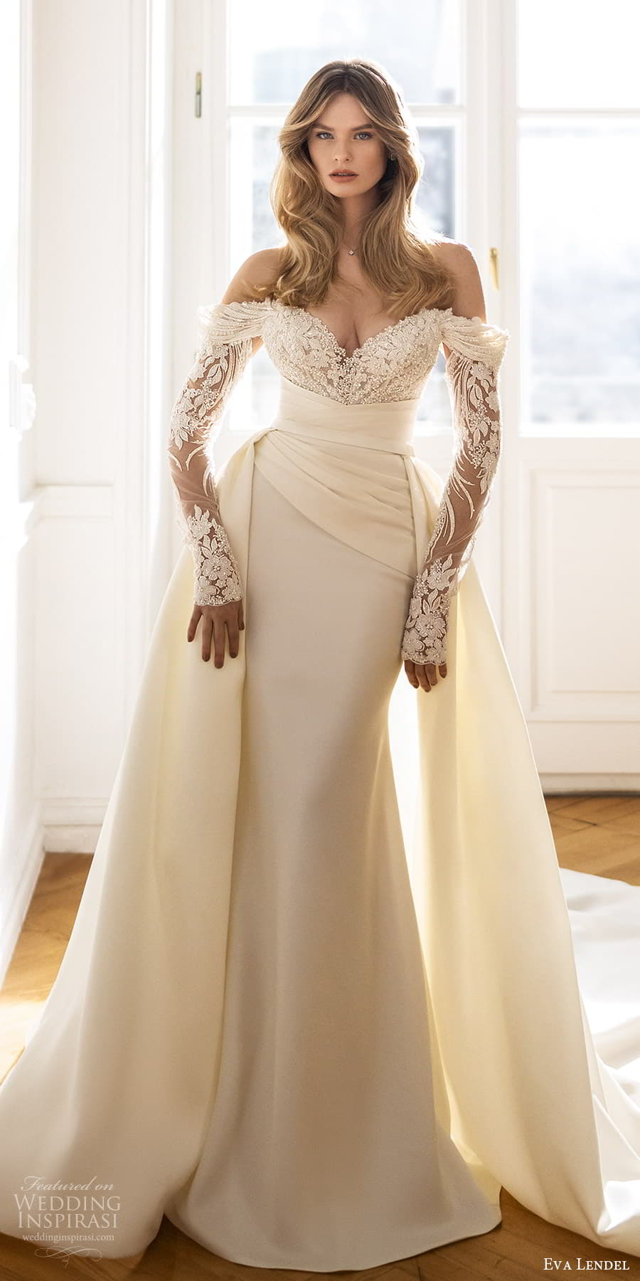eva lendel fall 2023 bridal sheer long sleeve off shoulder sweetheart neckline heavily embellished bodice clean skirt sheath wedding dress a line overskirt chapel train (14) mv eva lendel fall 2023 bridal sheer long sleeve off shoulder sweetheart neckline heavily embellished bodice clean skirt sheath wedding dress a line overskirt chapel train (14) mv