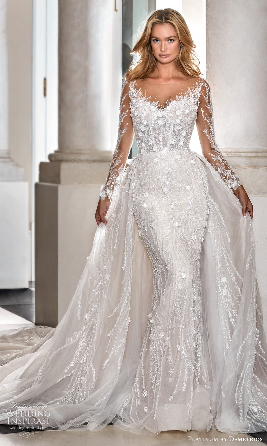 demetrios 2023 platinum bridal sheer long sleeve sweetheart neckline heavily embellished bodice sheath wedding dress chapel train a line overskirt (16) mv demetrios 2023 platinum bridal sheer long sleeve sweetheart neckline heavily embellished bodice sheath wedding dress chapel train a line overskirt (16) mv