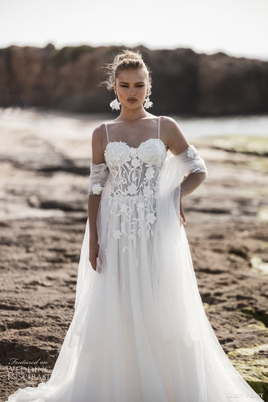 yaniv persy 2024 destinations bridal detached puff sleeves sleeveless straps plunging v semi sweetheart neckline fully embellished lace a line ballgown wedding dress chapel train rose color yaniv persy 2024 destinations bridal detached puff sleeves sleeveless straps plunging v semi sweetheart neckline fully embellished lace a line ballgown wedding dress chapel train rose color