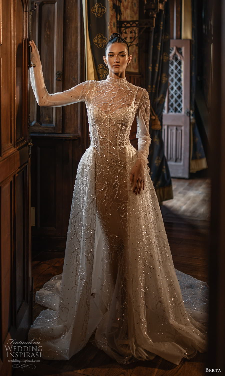 berta spring 2024 bridal sheer long sleeve high neckline fully embellished sheath wedding dress a line overskirt chapel train (3) mv