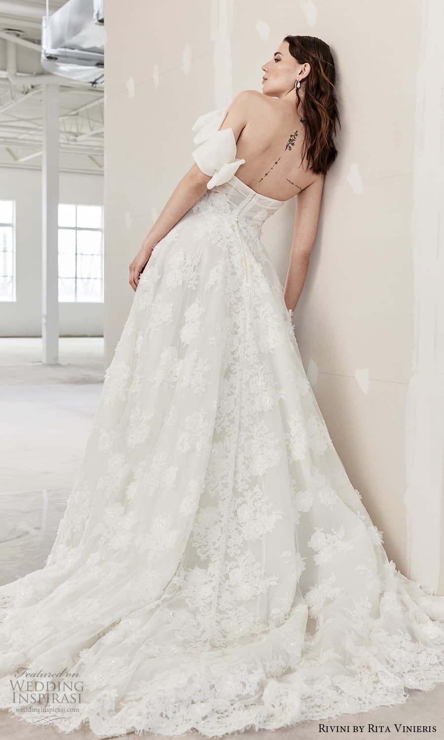 rivini rita vinieris spring 2024 bridal strapless straight across neckline one shoulder strap corset bodice a line ball gown wedding dress (7) bv rivini rita vinieris spring 2024 bridal strapless straight across neckline one shoulder strap corset bodice a line ball gown wedding dress (7) bv