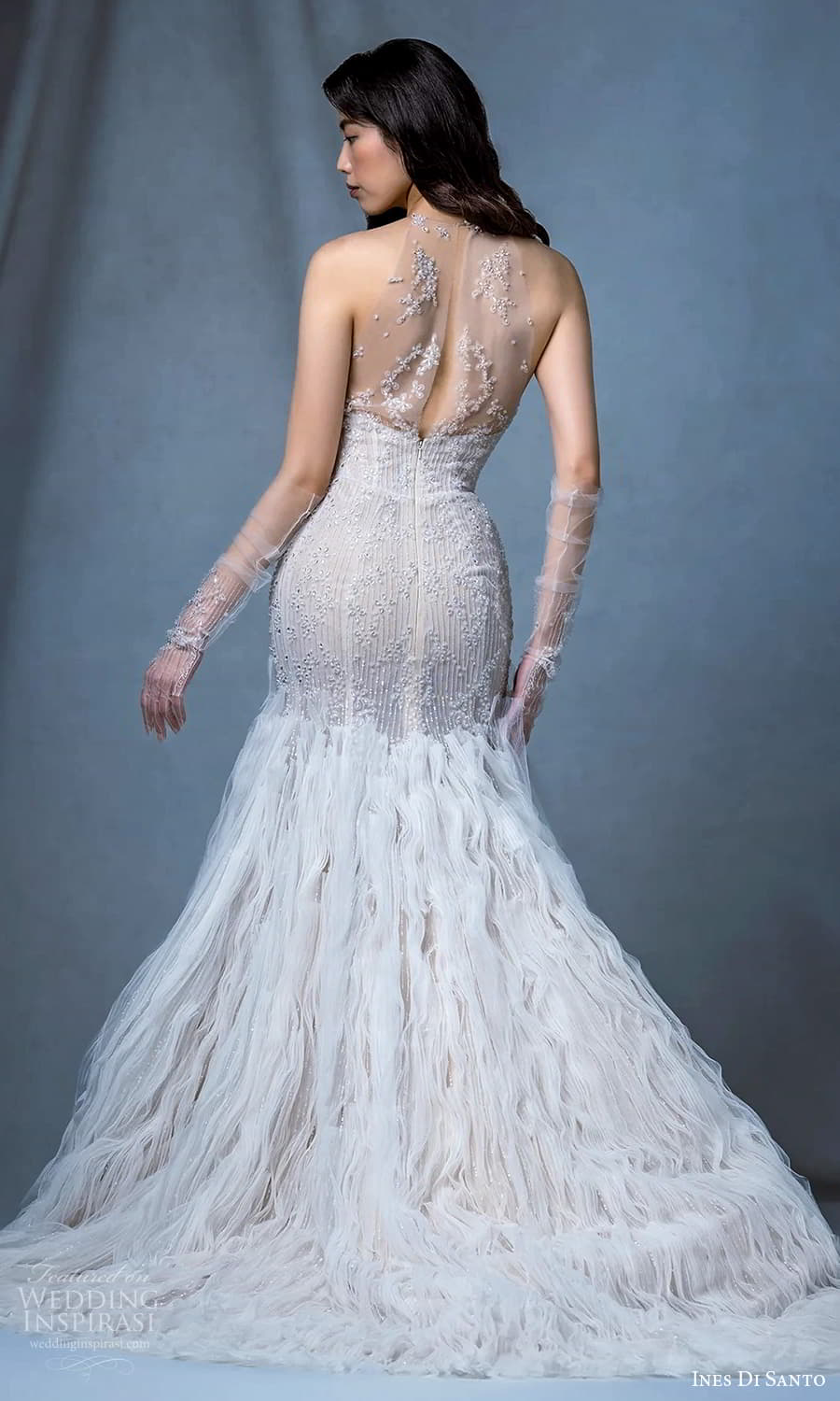 ines di santo fall 2024 bridal sleeveless illusion halter neckline heavily embellished bodice fit flare mermaid trumpet wedding dress chapel train ruffle skirt illusion back (11) bv