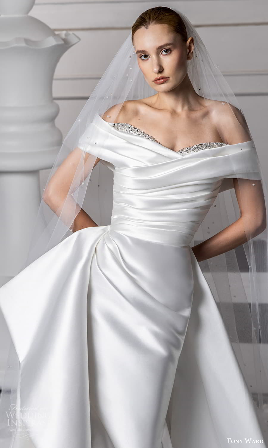 tony ward fall 2024 bridal off shoulder sleeves embellished sweetheart neckline pleated bodice clean minimalist sheath wedding dress a line overskirt chapel train (7) zv