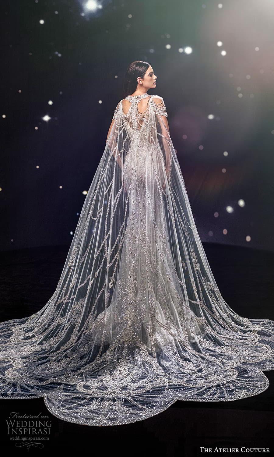 the atelier couture jimmy choo fall 2024 sheer short sleeve v neckline heavily embellished sheath fit flare wedding dress chapel train sheer tulle cape (2) bv the atelier couture jimmy choo fall 2024 sheer short sleeve v neckline heavily embellished sheath fit flare wedding dress chapel train sheer tulle cape (2) bv