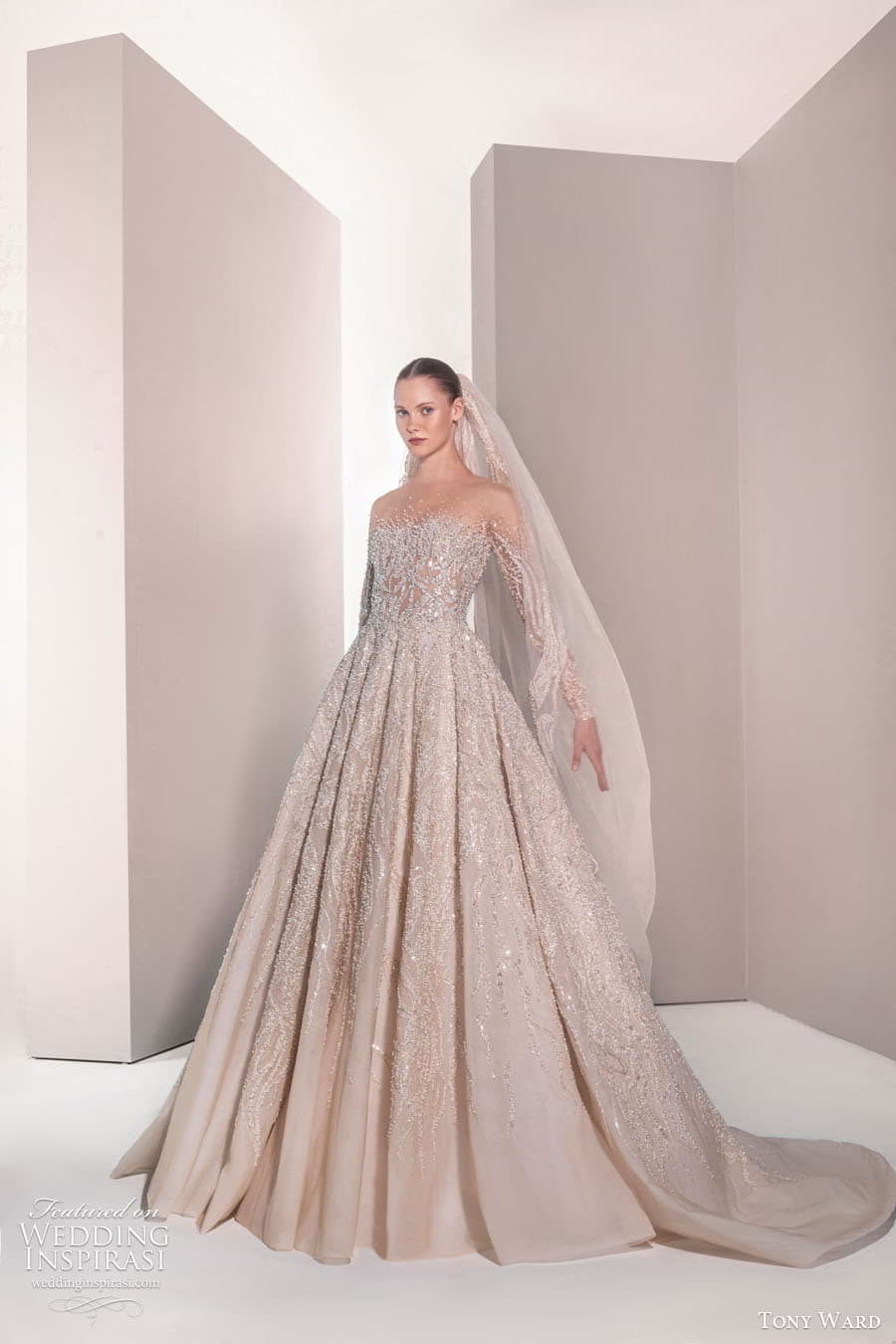 tony ward spring 2025 bridal sheer long sleeves illusion semi sweetheart neckline heavily embellished a line ball gown wedding dress chapel train blush color gladiolus 24 mv