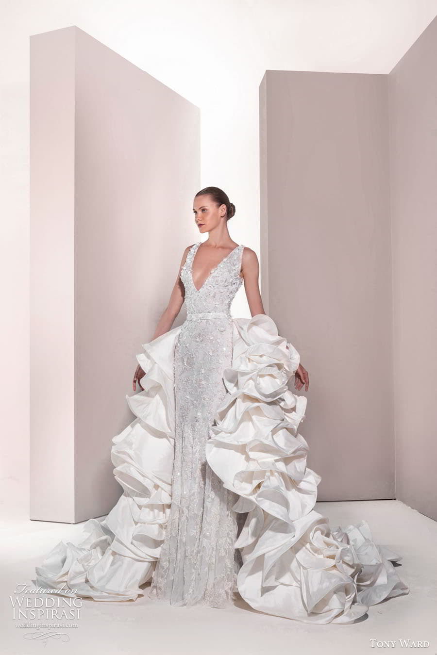 tony ward spring 2025 bridal sleeveless plunging v neckline heavily embellished column wedding dress a line overskirt chapel train carnation 18 mv