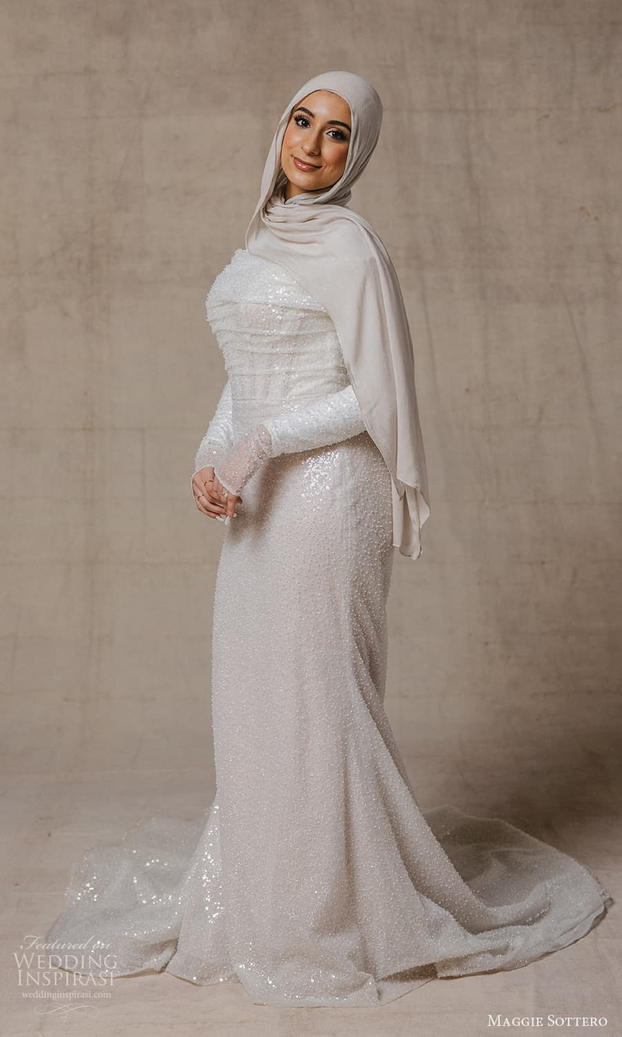 maggie sottero spring 2026 bridal long sleeves high neckline fully embellished modest sheath wedding dress chapel train hijab hijabi (2) mv maggie sottero spring 2026 bridal long sleeves high neckline fully embellished modest sheath wedding dress chapel train hijab hijabi (2) mv
